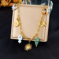 Detail of gold chain necklace featuring colorful ceramic sea shells and tropical fish charms - Ceramic Butterfly Tropical Fish Style (N3497)