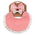 Close-up of pink muslin baby bib with beige lace trim and matching bow headbands - Watermelon red