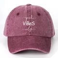 Detailed close-up of burgundy washed cotton baseball cap with good vibes only print - One Size / Burgundy