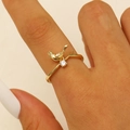 Close-up of golden bird crown ring featuring a branch band and sparkling zircon stone - Crown Bird With White Rhinestone Style (2567)