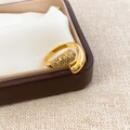 Macro shot of 18k gold plated open ring with colorful zircon stones on linen background - Gold (18K Gold Plated)