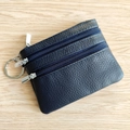 Dark blue leather coin purse with triple zipper compartments and litchi grain texture - Dark Blue