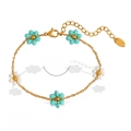 18k gold plated stainless steel bracelet featuring green and white crystal flowers - Gold/Blue Stone (Bracelet)