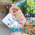 Portachiavi a sabbia mobile a forma di stella con paillettes blu e fiori bianchi - Stella Liquida (Blu)