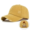 Close-up of distressed yellow washed cotton ponytail baseball cap with criss-cross back detail - Washed Distressed Ponytail Hole / Yellow
