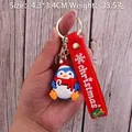 Cute Christmas penguin PVC keychain with red scarf and silicone strap for backpacks - Christmas Penguin