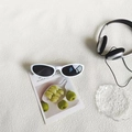 Vintage cat eye sunglasses featuring white oval frames and dark lenses for women - Grayish White