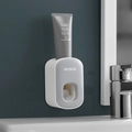 Wall-mounted automatic toothpaste dispenser in minimalist grey and white finish - Toothpaste Dispenser - Gray