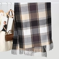 Detail shot of the soft plaid scarf texture and long fringe edges for autumn and winter - 180cmx64cm / Black Plaid