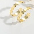 Elegant gold C-shaped earrings with layered metal disc design and high polish finish - Oval Linked Style