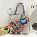 Off-white canvas tote bag featuring cute elephant embroidery and striped handles - Style 5 - Little Elephant and Balloons (Beige)