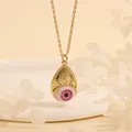 Detail of 18K gold-plated necklace with a teardrop evil eye pendant and pink iris - Pink Drop-C3