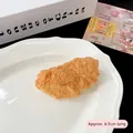Creative fried chicken hair clip in golden realistic texture measuring 6.5cm long - Fried Chicken Nugget