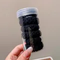 Set of six black elastic hair ties in a clear cylindrical jar with soft knitted texture - 1# Black 6 Pcs in Jar