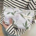 Chic light purple tulip embroidered satin cosmetic bag with secure zipper and side brand tag - Tulip Purple