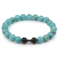 Macro shot of turquoise beaded bracelet with dark metal dumbbell charm on white background - Turquoise Black