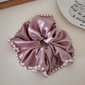 Pink satin silk scrunchie with pearl trim edges for elegant hair styling - Pink
