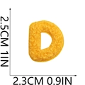 Detail view of yellow chenille letter patch showing dimensions 2.5cm by 2.3cm - Letter-D