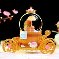 Luminous capybara carriage snow globe decor with golden crown and ornate wheels - MA Large 100 Snowfall + Inner Rotation + Light / 2432 Yellow Umbrella