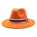 Detail of orange wool fedora hat featuring red and blue patterned decorative band - Orange