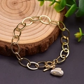 Golden OT clasp chain bracelet featuring a unique white baroque pearl pendant - White Baroque Pearl Pendant Bracelet