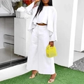 Women's two-piece set in white featuring flare sleeve top and high-waisted wide-leg pants - S / White