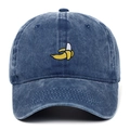 Close-up of yellow banana embroidery on dark blue washed denim baseball cap - Navy Blue