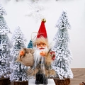 Detail of Santa plush doll with metal glasses and bells set in a snowy Christmas scene - 5 Inch New Red Hat with Grey Trim