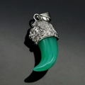 Macro detail of silver lion head pendant with translucent green resin wolf tooth - Steel Green Tooth (No Chain)