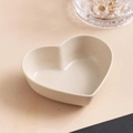 Beige heart-shaped wheat straw seasoning dish with matte finish and speckled texture - Nordic Beige