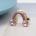 Close-up of golden geometric triangle hair claw clip with pink rhinestones and crystals - Pink E7311