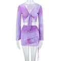 Detail of purple tie-dye mesh set featuring a lace-up V-neck top and ruched mini skirt - XL / Purple