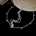 Macro detail of multi-layer rhinestone head chain with silver tassels and round crystals - Multi-layer Rhinestone Headpiece (Silver) / Silver