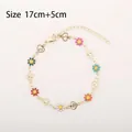 Golden daisy bracelet with colorful enamel charms and heart details in 17cm plus 5cm size - Multicolor Daisy with Heart (Gold Tone)