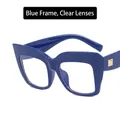 Occhiali oversize blu a gatto con lenti trasparenti e dettagli in metallo dorato - Montatura blu