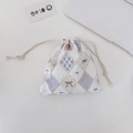 Cute waffle fabric drawstring pouch with blue diamond pattern and tiny black bows - Diamond Bear