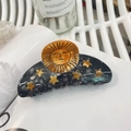 Eleganter Haarklammer aus Acetat mit Sonnen- und Mondmotiv in Schwarz und Gelb - Sonne und Sterne / Goldene Sonne - Schwarze Kralle