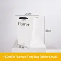 White trapezoid gift bag with clear window, black handles, and romantic flower print - Small FLOWER Trapezoidal White