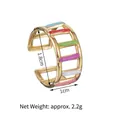 Detail shot of golden striped open ring featuring vibrant multi-colored enamel layers - Hollow Stepped Colorful Enamel