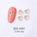 Macro view of heart-shaped gold alloy nail art charm with rhinestones and 6.5mm size specs - Gold Pave Diamond Heart (8897)