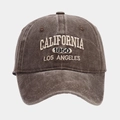 Close-up of vintage washed brown cotton baseball cap featuring ivory CALIFORNIA embroidery - Adjustable / Embroidery/Distressed / Coffee