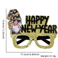 Golden Happy New Year glasses with gnome detail, size 17.5cm width and 13.6cm height - Happy New Year Gnome Style