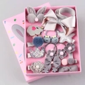 Set de 18 accesorios para el pelo de niña con coronas y lazos en una caja rosa - Gris Caja Estándar