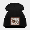 Detail of black knitted beanie showing square patch with cake and donut embroidery - Style 7-Square Donut Patch