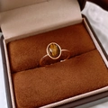 Detail of 18k gold plated tiger eye stone ring showcased in a premium velvet gift box - Gold Oval Tiger Eye Style