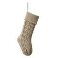 Cream cable-knit Christmas stocking with chunky texture and decorative tassel trim - Flaxen