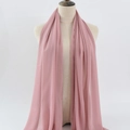 Elegant pink bubble chiffon hijab scarf draped on a mannequin for premium texture display - 5