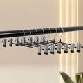 Set of 10 black non-slip pants hangers with adjustable metal clips for skirts and trousers - Coated Black
