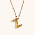 Close-up of 18K gold plated bead chain with a puffer style metal letter Z pendant - Gold-Z