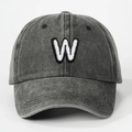 Close-up of vintage washed cotton grey baseball cap with embroidered W letter detail - Letter W